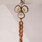 CREME FLOWER BROWN SHORT PHONE STRAP