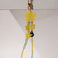 YELLOW FLORA SHORT CRYSTAL PHONE STRAP
