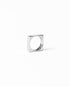 Close-up of a delicate MAISON MEGH Edge Ring jewelry piece with intricate design on a plain background.
