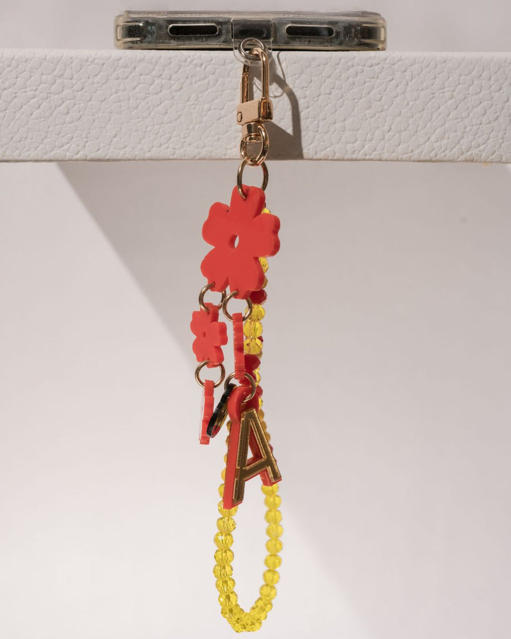 FLORA RED 
SHORT CRYSTAL PHONE STRAP
