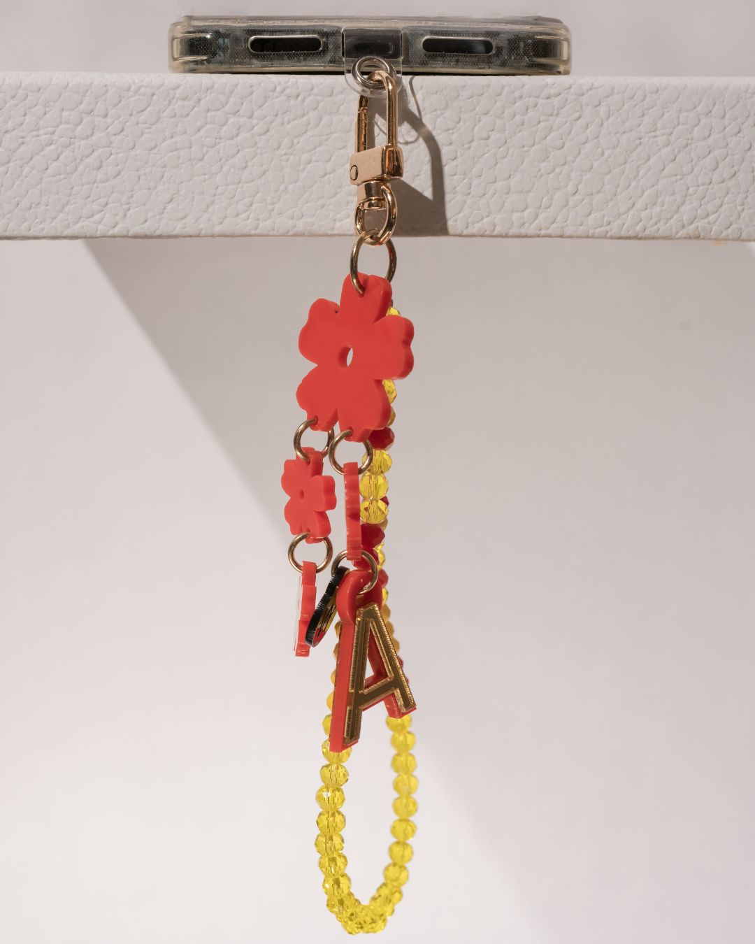 FLORA RED 
SHORT CRYSTAL PHONE STRAP