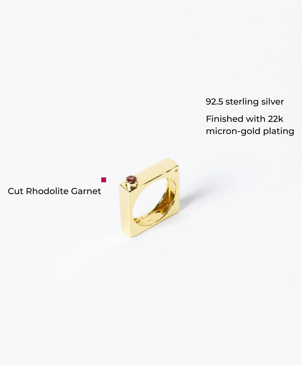 Elegant edge ring with sparkling gems from MAISON MEGH, showcasing a stylish jewelry piece with intricate design and gemstone accents.