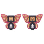 BUTTERFLY STUDS IN MAJENTA