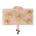 THE CREME BUTTERFLY CLUTCH