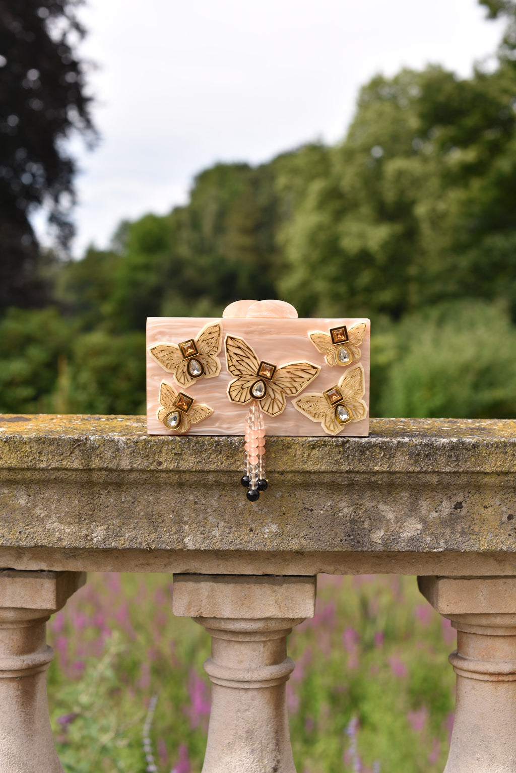 THE CREME BUTTERFLY CLUTCH