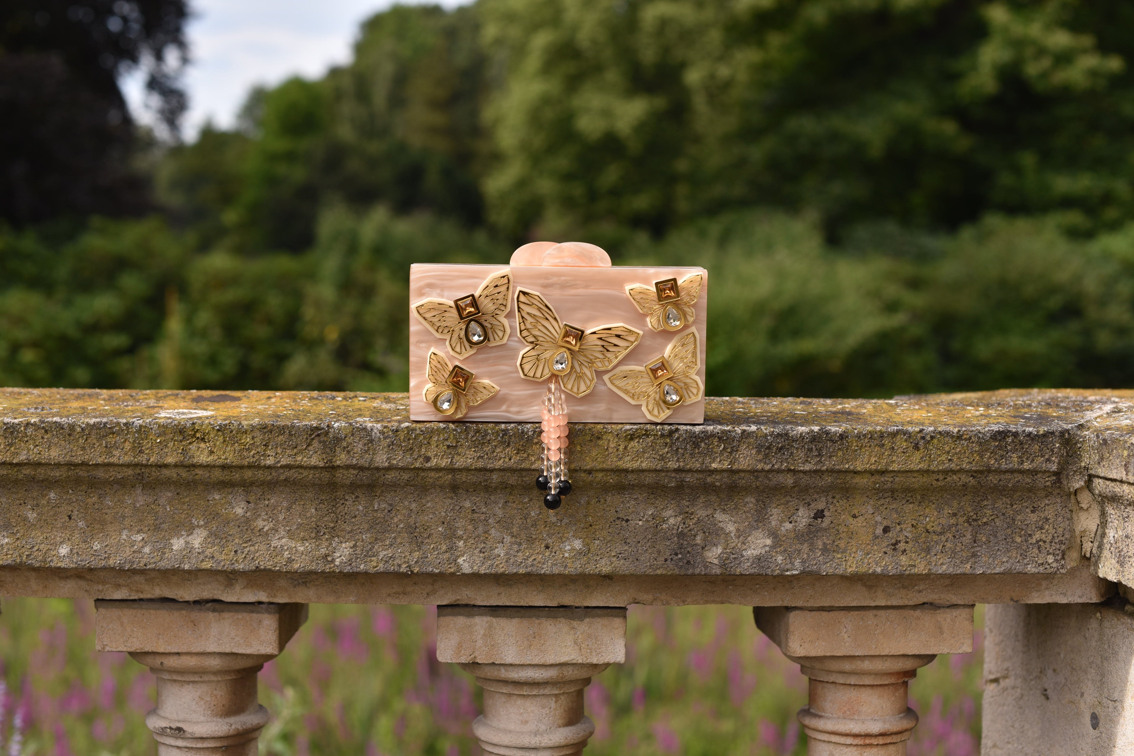 THE CREME BUTTERFLY CLUTCH