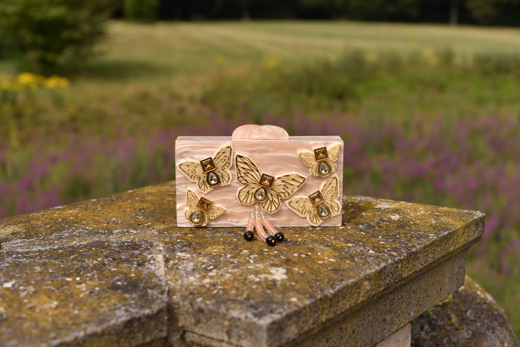 THE CREME BUTTERFLY CLUTCH