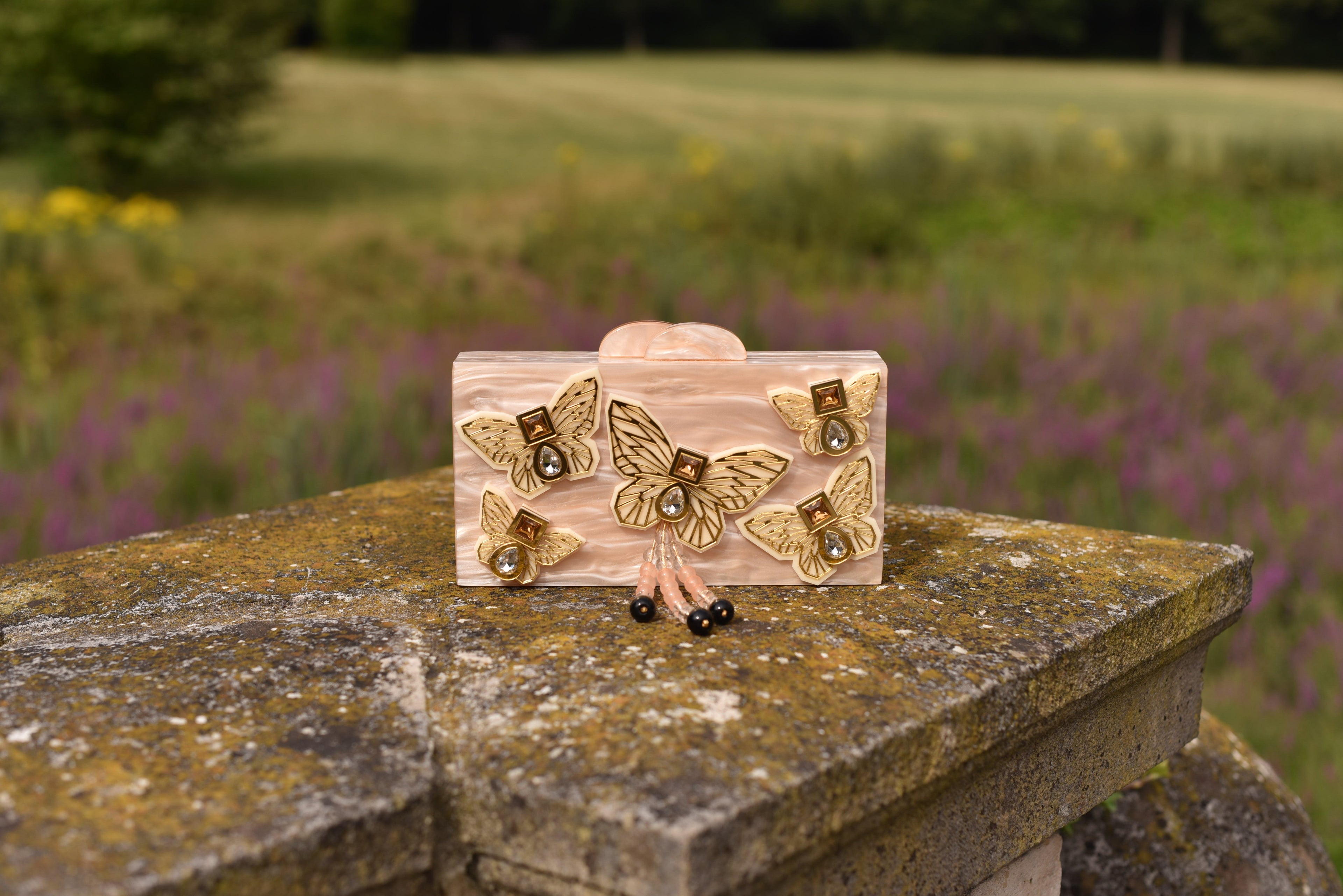 THE CREME BUTTERFLY CLUTCH