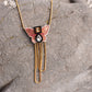THE BUTTERFLY NECKLACE IN MAJENTA