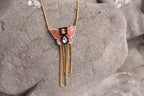 THE BUTTERFLY NECKLACE IN MAJENTA