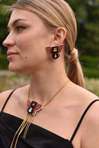 BUTTERFLY STUDS IN MAJENTA