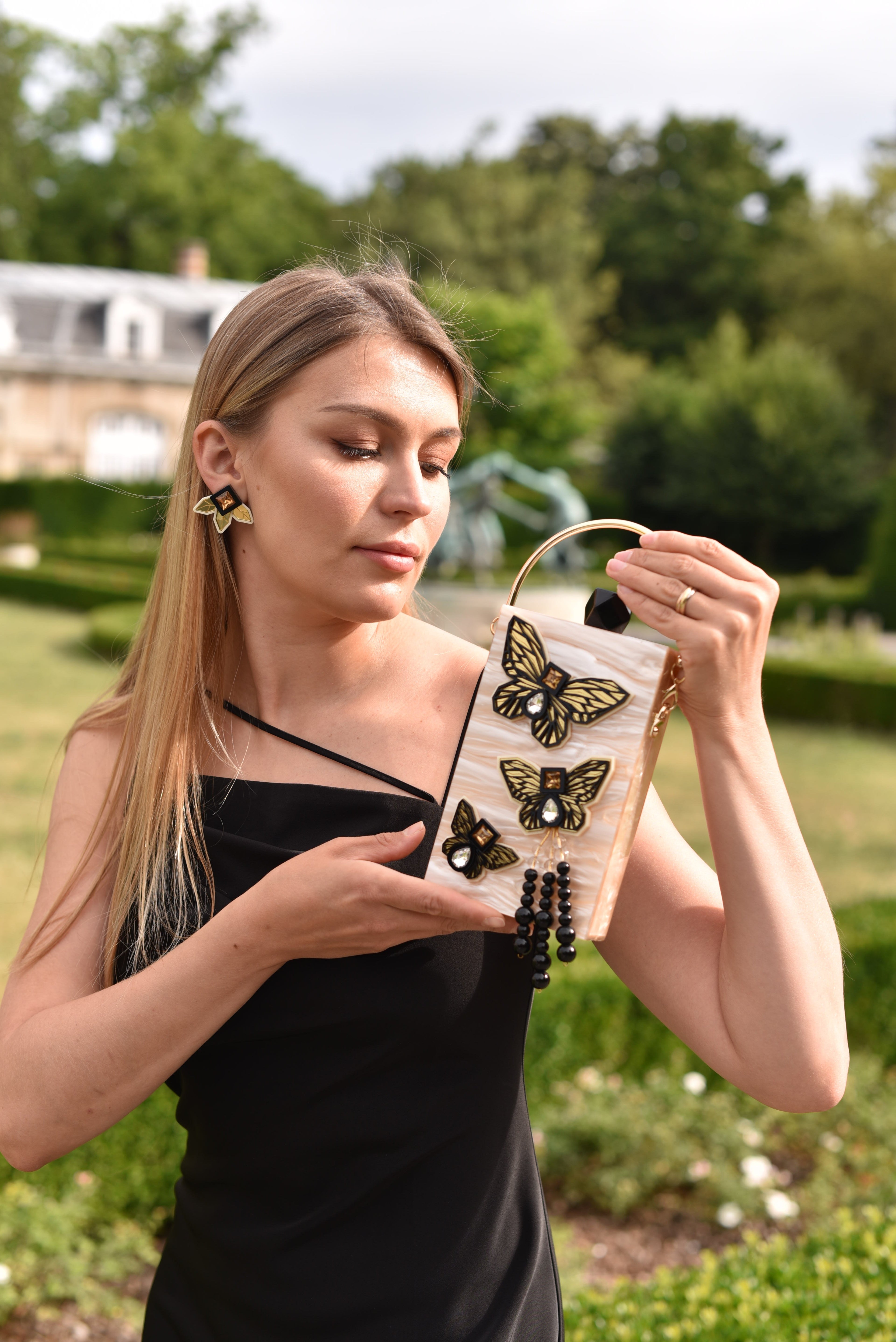 THE CREME BUTTERFLY MOBILE BAG