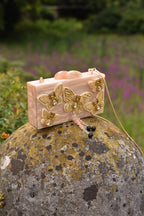 THE CREME BUTTERFLY CLUTCH