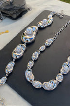 COSMOS Glam Bib Chrome