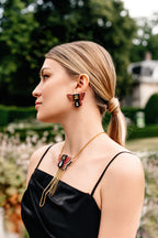 THE BUTTERFLY NECKLACE IN MAJENTA