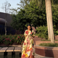 NIRVANA DRESS IN SOL GARDEN PRINT (SANSTONE)