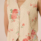Floral-patterned vest worn by a person on a plain background Calling June