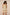 Woman wearing a floral strapless dress against a beige background Calling June