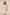 Woman wearing a beige patterned dress against a plain background Calling June