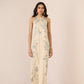 Woman wearing a floral dress on a plain background Calling June