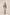 Woman wearing a patterned blouse and light blue pants on a beige background Calling June