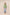 Woman wearing a green embroidered blouse and light blue jeans on a beige background Calling June