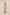 Woman wearing a floral blouse and light blue jeans on a beige background Calling June