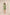 Woman wearing a green dress with white embroidery on a beige background Calling June