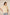 Woman wearing a beige embroidered shirt with short sleeves on a beige background Calling June