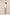 Woman wearing a light yellow blouse and light blue jeans on a beige background Calling June