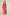Woman wearing a pink dress with white embroidery on a beige background Calling June