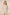 Woman wearing a floral patterned outfit on a beige background Calling June