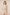 Woman wearing a floral outfit on a beige background Calling June