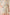 Person wearing a floral outfit with shorts and a top on a plain background Calling June
