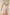 Beige outfit with blue floral pattern on a plain background Calling June