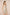 Woman wearing a floral set and shorts set on a beige background Calling June