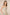Woman wearing a floral dress with a beige background Calling June