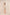 Woman wearing a patterned dress and shorts on a beige background Calling June