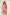 Woman wearing a pink dress with a geometric pattern on a plain background Calling June