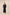 Woman wearing a black dress against a beige background Calling June