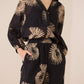 Woman wearing a black outfit with gold floral patterns on a beige background Calling June