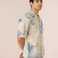 Man wearing a patterned shirt with a neutral background Calling June