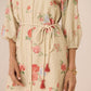 Beige floral dress with a drawstring waist on a plain background Calling June