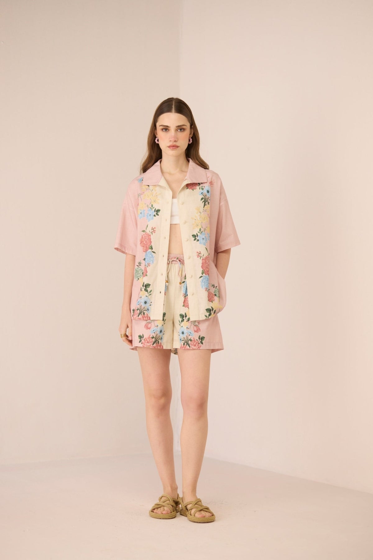 Woman wearing a floral shorts set Calling June