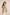 Woman wearing a green patterned top with a beige background Calling June